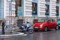 Vienna, Austria - May 16, 2019: three type of vehicle parked at street bicycle moped scooter and car