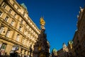 VIENNA, AUSTRIA : memorial Plague column Pestsaule and tourists on Graben street Vienna. The Graben is one of the most famous