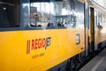 Regiojet logo on passenger car of train belonging to the company. Royalty Free Stock Photo
