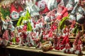 People buy Christmas baubles, toys and souvenirs at traditional Christmas market in front of