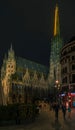 Stephansdom cathedral tower spire and Vienna at night Royalty Free Stock Photo