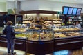 The interior of the store with a large selection of bread, rolls