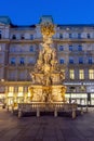 Vienna, Austria - October 2021: Plague Column Trinity column on Graben street at night