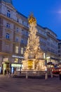 Vienna, Austria - October 2021: Plague Column Trinity column at night on Graben street