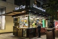 Vendor in its food kiosk at night in Vienna, Austria Royalty Free Stock Photo