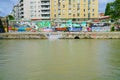 Graffiti vandalism on walls constructed along River Danube.