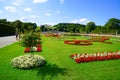 Great Parterre or landscaped green and patterned flower garden area in Schronbrunn Palace grounds