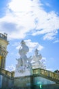 Vienna Austria - September 4 2017; Imposing white marble sculpture of soldier above the Gloriette balustrade against clear blue