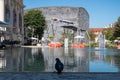 Vienna, Austria. 29 Septemner 2023. Fountain in Museum Quartier with solar panels and Mumok Museum of Modern Art in the background Royalty Free Stock Photo