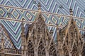 St. Stephen`s Cathedral in Wien downtown, seat of the Archbishop of Vienna, detail of roof with famous coloured glazed tiles Royalty Free Stock Photo