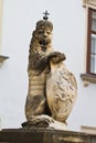 Stone statue of lion in a crown holding a shield at Swiss Gate entrance or Schweizertor in Hofburg Imperial Palace, Innere Stadt Royalty Free Stock Photo