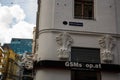 Vienna, Austria: An unusual Sculpture on the house: the white hands of a magician, a hat and a rabbit