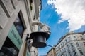 Vienna, Austria: An unusual Sculpture on the house: the white hands of a magician, a hat and a rabbit