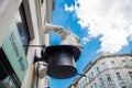 Vienna, Austria: An unusual Sculpture on the house: the white hands of a magician, a hat and a rabbit