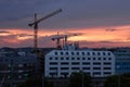 Vienna city sunset. Cranes and buildings