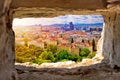 Vienna cityscape and sun haze view through stone window Royalty Free Stock Photo