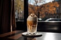 Vienna coffee in tall transparent glass on table Royalty Free Stock Photo