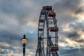Vienna Ferris Wheel and street lamp at sunset, Austria Royalty Free Stock Photo