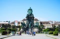 Group tourist and local people at Empress Maria Theresien Denkmal Monument in the natural history museum at Vienna, Austria