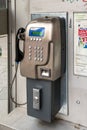 Vertical view of public payphone in downtown Vienna