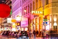 Vienna at night. Facades of houses are decorated with lamps of different colors