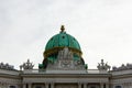 Vienna, Vienna State/Austria - April 4 2018: Green colored copper dome above the main part of the Hofburg palace in Vienna