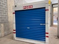 A PODS storage and moving container placed at a loading dock in an apartment building