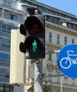 Vienna, WIEN, Austria - August 22, 2023: traffic light with green symbol of person on bike