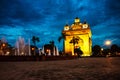 Vientiane, Laos. Patuxay park at night with illuminated Gate of Victory