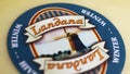 Closeup of traditional dutch country Landana cheese logo lettering with windmill Royalty Free Stock Photo