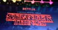 Netflix series Stranger things cover poster on smartphone screen on computer keyboard Royalty Free Stock Photo