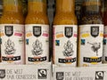 View on bottles deli fair curry sauce in shelf of german supermarket