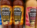 View on bottles Heinz street food sauce in shelf of german supermarket