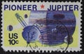Close up of 10 cent US stamp with motive of pioneer jupiter issued 1975