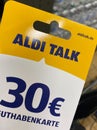 Close up of mobile phone 30 Euro recharging card of Aldi talk provider in store