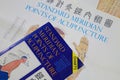 Close up of poster and book about standard meridian points in acupuncture Royalty Free Stock Photo