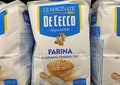 Closeup of bags De Cecco italian Farina wheat flour in shelf of german store