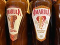 Closeup of bottles with Amarula coffee cream liqueur in shelf of german supermarket
