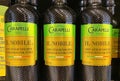 Closeup of bottles italian Casa Olearia Carapelli Il Nobile olive oil in shelf of german supermarket Royalty Free Stock Photo