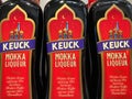 Closeup of bottles Keuck mokka liqueur in shelf of german supermarket Royalty Free Stock Photo