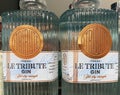 Closeup of Bottles Le Tribute spanish dry gin in shelf of german store