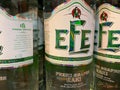 Closeup of bottles with turkish graps efe raki in shelf of german supermarket
