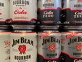 Closeup of cans with Jim Beam mixed cola drinks in shelf of german supermarket