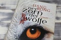 Closeup of chinese author Jiang Rong book cover Wolf Totem, german Edition