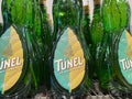 Closeup of green bottles Mallorca Tunel herb liqueur in shelf of german supermarket