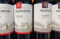 Closeup of italian Mezzacorona variety red wine bottles in shelf of german supermarket