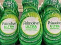 Closeup of plastic bottles Palmolive ultra dishwashing liquid in shelf of german store