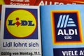 Macro closeup of weekly printed advertising inserts from german discounter companies lidl and aldi