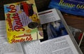 View on travel guide books on wood table for preparation of Route 66 trip