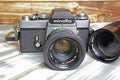 Minolta XE-5 single lens analog film reflex camera with tele objective